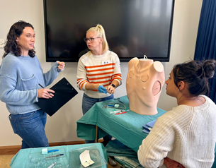 Three people discussing